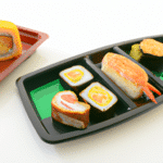 Nie musisz wychodzić z domu by zjeść pyszne sushi - sprawdź jak łatwo dostać je z dostawą